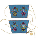 Northern Plains Polychrome Beaded Leather Cuffs with Floral Designs c. 1890s, 7" x 10.5" each