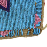 Northern Plains Polychrome Beaded Leather Cuffs with Floral Designs c. 1890s, 7" x 10.5" each