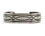 Orville Tsinnie (1943-2017) - Navajo - Heavy Sterling Silver Bracelet with Stamped Design c. 1970-80s, size 7