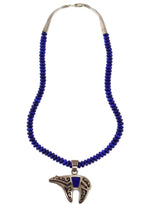 Dina Huntinghorse - Wichita/Kiowa - Lapis Lazuli and Sterling Silver Overlay Heartline Bear Pendant and Lapis Lazuli Beaded Necklace c. 1980-90s, 20" length