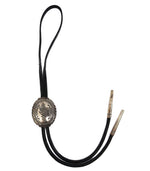 Thomas Curtis (1942-2013) - Navajo - Sterling Silver and Leather Bolo Tie with Stamped Design c. 1960-70s, 3.125" x 2.5" bolo