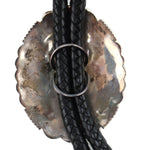 Thomas Curtis (1942-2013) - Navajo - Sterling Silver and Leather Bolo Tie with Stamped Design c. 1960-70s, 3.125" x 2.5" bolo