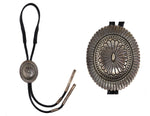 Thomas Curtis (1942-2013) - Navajo - Sterling Silver and Leather Bolo Tie c. 1970s, 2.875" x 2.25" bolo