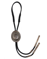 Thomas Curtis (1942-2013) - Navajo - Sterling Silver and Leather Bolo Tie c. 1970s, 2.875" x 2.25" bolo
