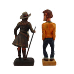 Pair of Wood Carved Figurines - (1.) Dee Flagg (1922-1999) - "Annie Oakley" with (Unsigned) Standing Man