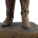 Pair of Wood Carved Figurines - (1.) Dee Flagg (1922-1999) - "Annie Oakley" with (Unsigned) Standing Man