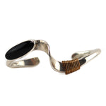 Richard Aguilar - Santo Domingo (Kewa)/Coushatta - Contemporary Jet, 12K Gold, and Sterling Silver Bracelet with Twisted Design, size 6.125