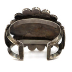 Zuni - Multi-Stone Channel Inlay and Silver Bracelet with Sunface Kachina Design c. 1950s, size 7