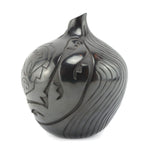 Sharon Naranjo Garcia (b. 1951) - Santa Clara Black Vase with Carved Avanyu and Heartline Bear Design c. 1990s, 8" x 6.5"
