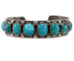 Navajo - Turquoise and Silver Bracelet with Butterfly and Whirling Logs Stamped Design c. 1920-30s, size 6.5