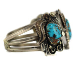 Augustine Largo - Navajo - Turquoise and Silver Bracelet with Floral and Feather Design c. 1970s, size 6.5