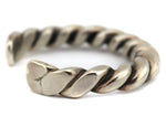Orville Tsinnie (1943-2017) - Navajo - Sterling Silver Bracelet with Rope Design c. 1970s, size 6.25