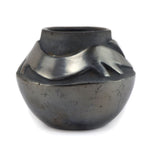 Rose Gonzales (1900-1989) - San Ildefonso Black Gunmetal Jar with Carved Avanyu Design c. 1940s, 4" x 4.75"