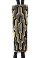 Dan A. Jackson (1944-2022) - Navajo - Silver Overlay and Leather Bolo Tie c. 1970-80s, 3.5" x 1.25" bolo