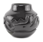 Anita Louise Suazo (b. 1937) - Santa Clara Black Jar with Carved Avanyu Design c. 1980s, 4" x 4.5"
