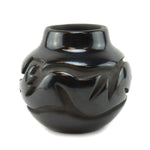 Anita Louise Suazo (b. 1937) - Santa Clara Black Jar with Carved Avanyu Design c. 1980s, 4" x 4.5"