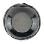 Anita Louise Suazo (b. 1937) - Santa Clara Black Jar with Carved Avanyu Design c. 1980s, 4" x 4.5"