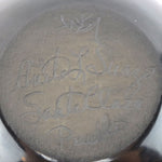 Anita Louise Suazo (b. 1937) - Santa Clara Black Jar with Carved Avanyu Design c. 1980s, 4" x 4.5"