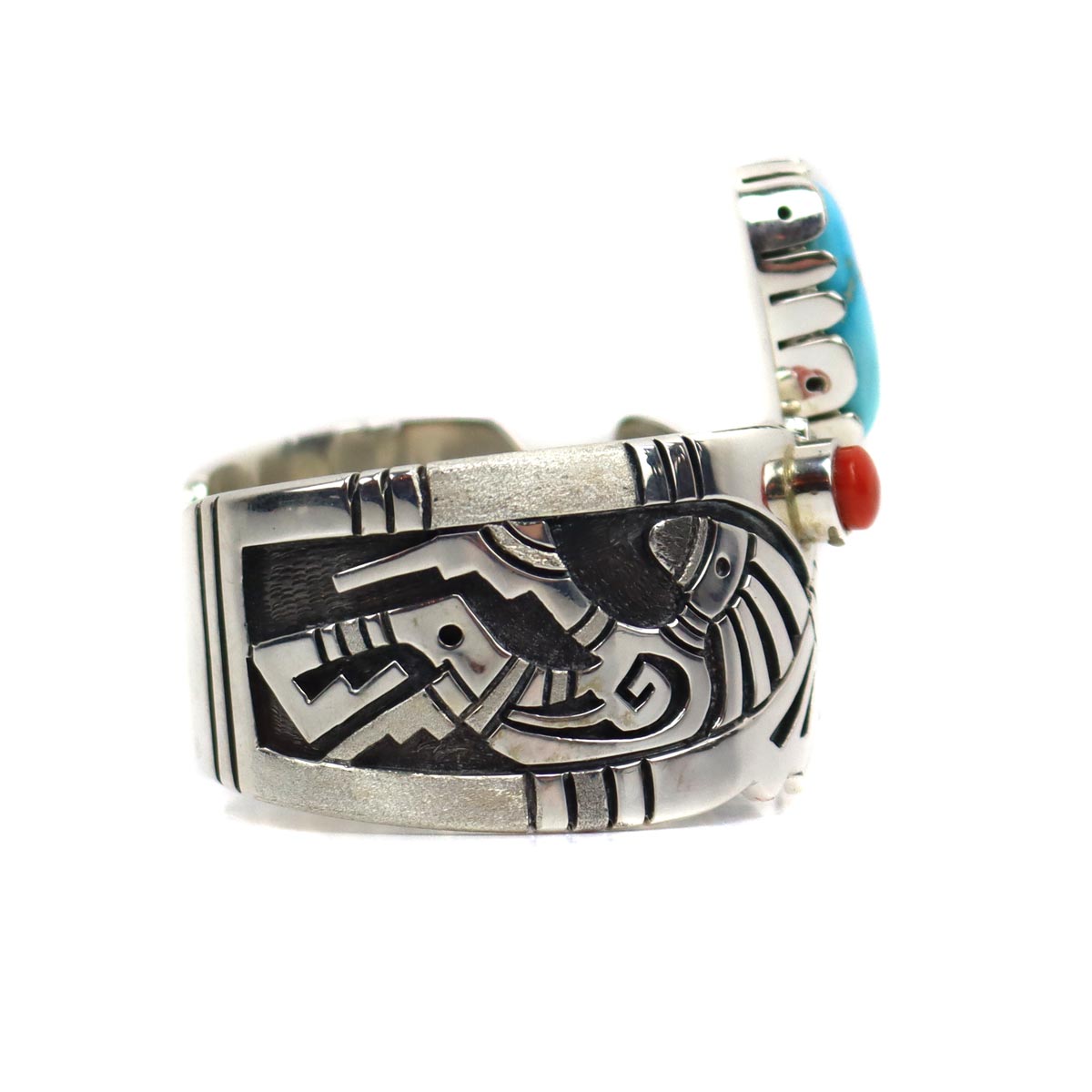 
Roy Talahaftewa - Hopi Contemporary Morenci Turquoise, Coral, and Sterling Silver Overlay Bracelet, size 6.75 (J15270) 1