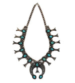 
Navajo Turquoise and Silver Squash Blossom Necklace c. 1960s, 22" length (J15561)