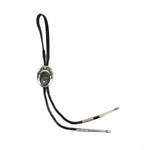 
Hubert Yowytewa - Hopi Sterling Silver Ovleray and Leather Bolo Tie with Kokopelli Design c. 1998, 2.75" x 2" (J15624-CO-027) 1