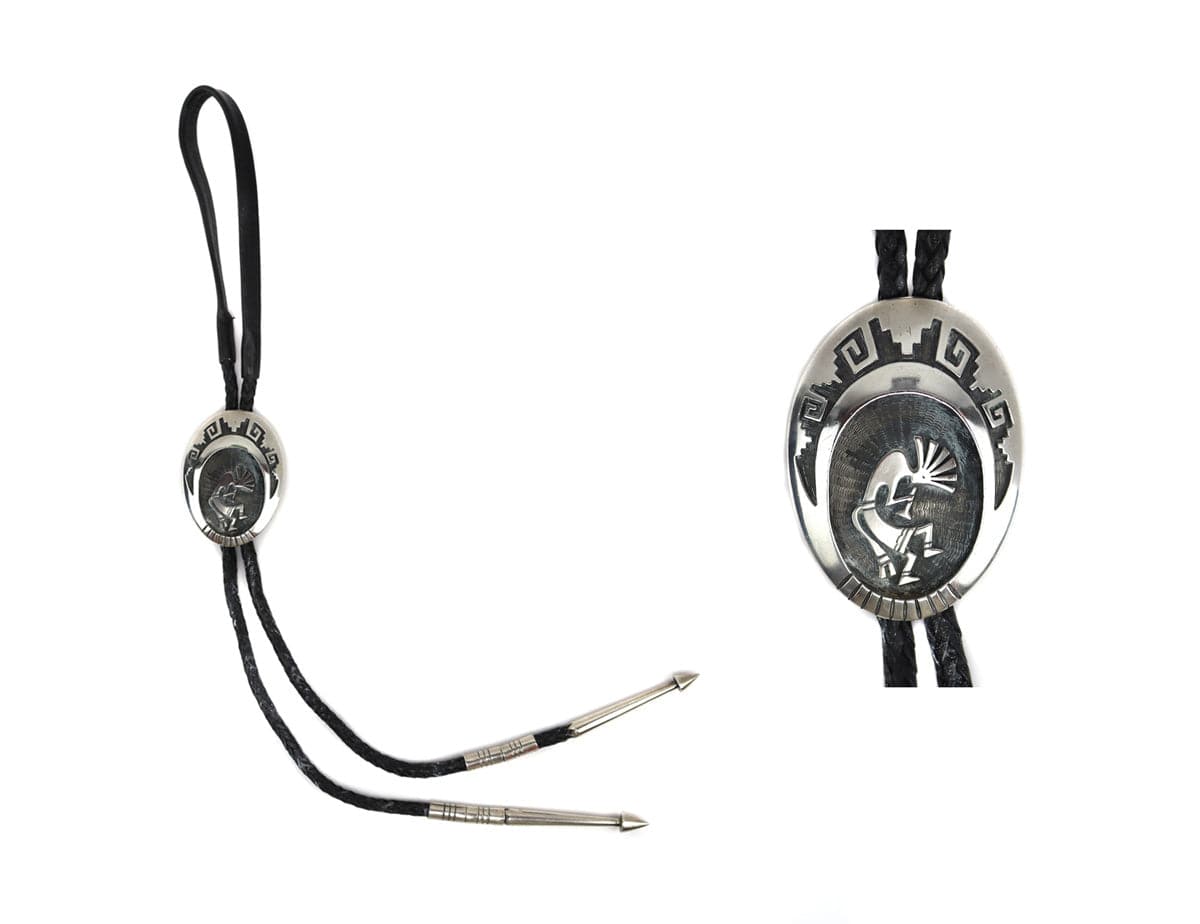 
Hubert Yowytewa - Hopi Sterling Silver Ovleray and Leather Bolo Tie with Kokopelli Design c. 1998, 2.75" x 2" (J15624-CO-027)