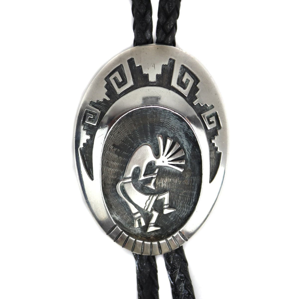 
Hubert Yowytewa - Hopi Sterling Silver Ovleray and Leather Bolo Tie with Kokopelli Design c. 1998, 2.75" x 2" (J15624-CO-027) 2