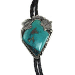 Navajo Morenci Turquoise, Silver and Leather Bolo Tie c. 1960s, 2.25" x 1.5" bolo (J15654)
