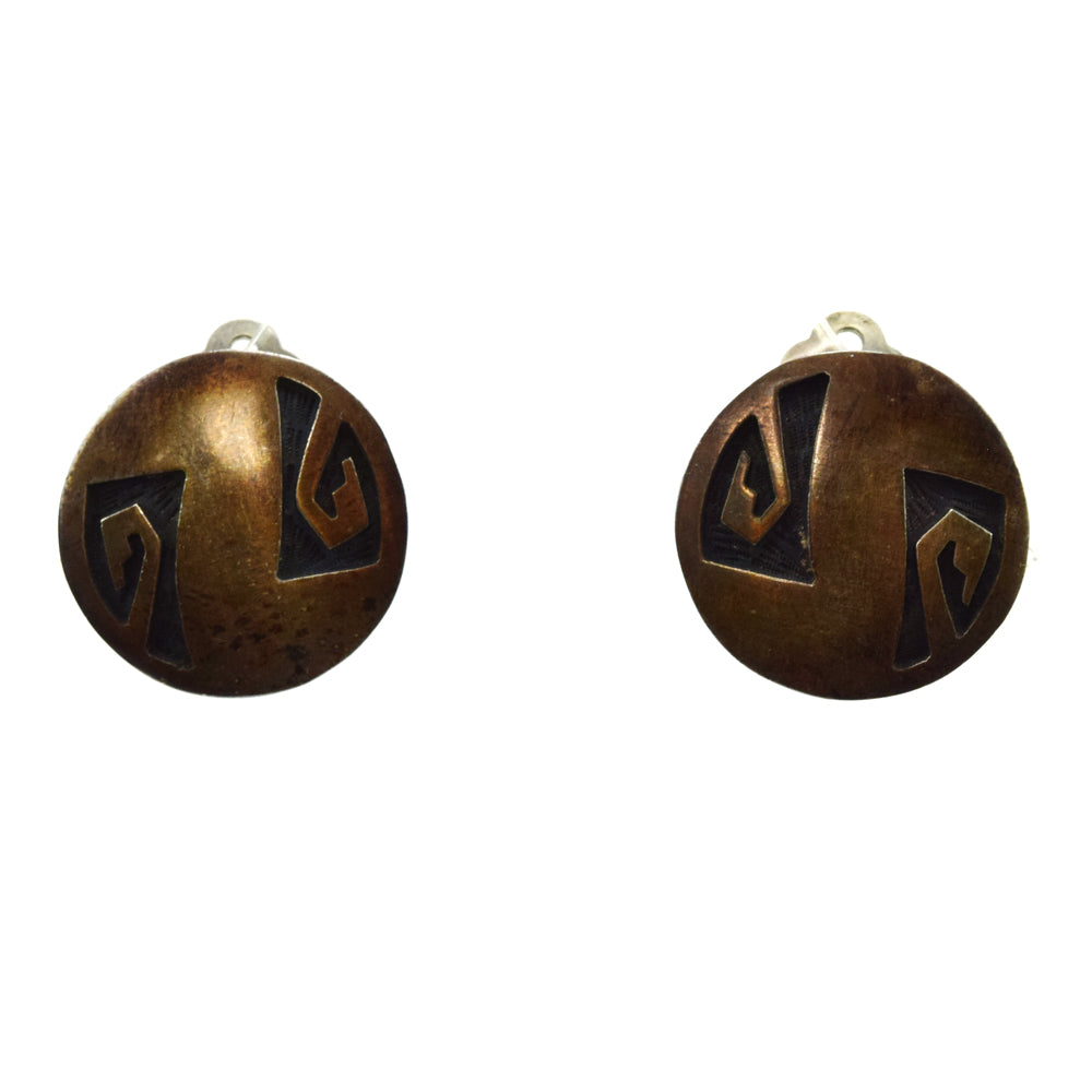 Raymond Sequaptewa (b. 1948) - Hopi Crafts Silver Overlay Clip-on Earrings c. 1970s, 0.875" diameter
