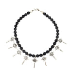 Miramontes - Necklace with 9 Silver Sandcast Star Crosses on Onyx Beads, 17" Length (J91305-1221-018)