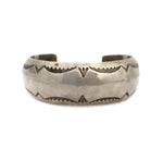 Orville Tsinnie (1943-2017) - Navajo Sterling Silver Bracelet with Stamped Design c. 1990-2000s, size 7.5 (J91963-0123-001)
