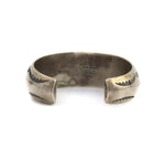 Orville Tsinnie (1943-2017) - Navajo Sterling Silver Bracelet with Stamped Design c. 1990-2000s, size 7.5 (J91963-0123-001)
1